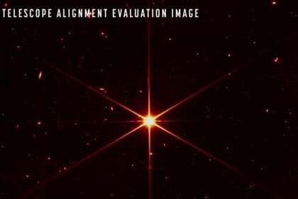 While the purpose of this image was to focus on the bright star at the center for alignment evaluation, Webb's optics and NIRCam are so sensitive that the galaxies and stars seen in the background show up. At this stage of Webb’s mirror alignment, known as “fine phasing,” each of the primary mirror segments have been adjusted to produce one unified image of the same star using only the NIRCam instrument. This image of the star, which is called 2MASS J17554042+6551277, uses a red filter to optimize visual contrast. Credits: NASA/STScI