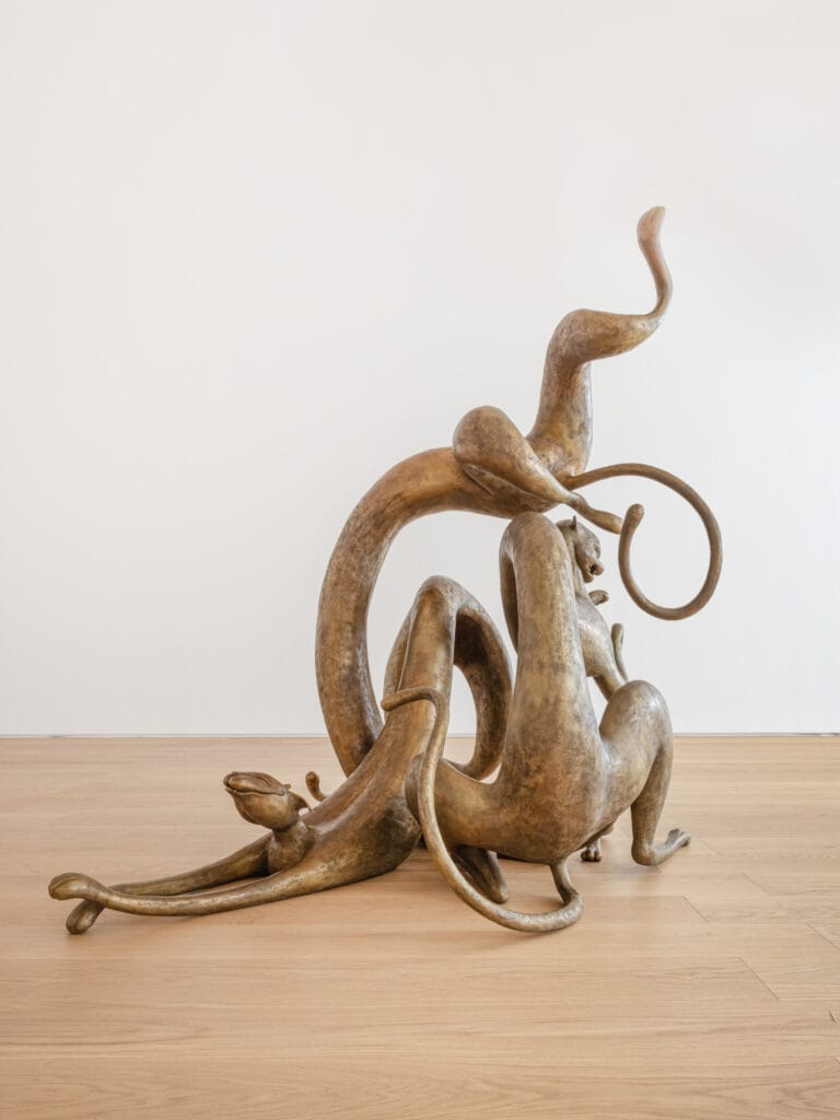 Strange Loop, 2021. Ferric nitrate patina on bronze, three figures. Overall (approximate) : 70 7/8 × 63 × 51 3/16 inch | 180 × 160 × 130 cm. Grumpy Cat : 37 3/8 × 28 3/8 × 52 3/4 inch | 95 × 72 × 134 cm. Happy Cat : 30 11/16 × 75 9/16 × 24 7/16 inch | 78 × 192 × 62 cm. Sleepy Cat : 70 7/8 × 23 5/8 × 43 5/16 inch | 180 × 60 × 110 cm. Edition 1 of 7 + 1 artist proof. Courtesy of the artist, Perrotin, and Altman Siegel, San Francisco.