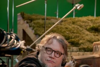 Guillermo del Toro on the set of Guillermo del Toro’s Pinocchio, 2022. Image courtesy Jason Schmidt/Netflix