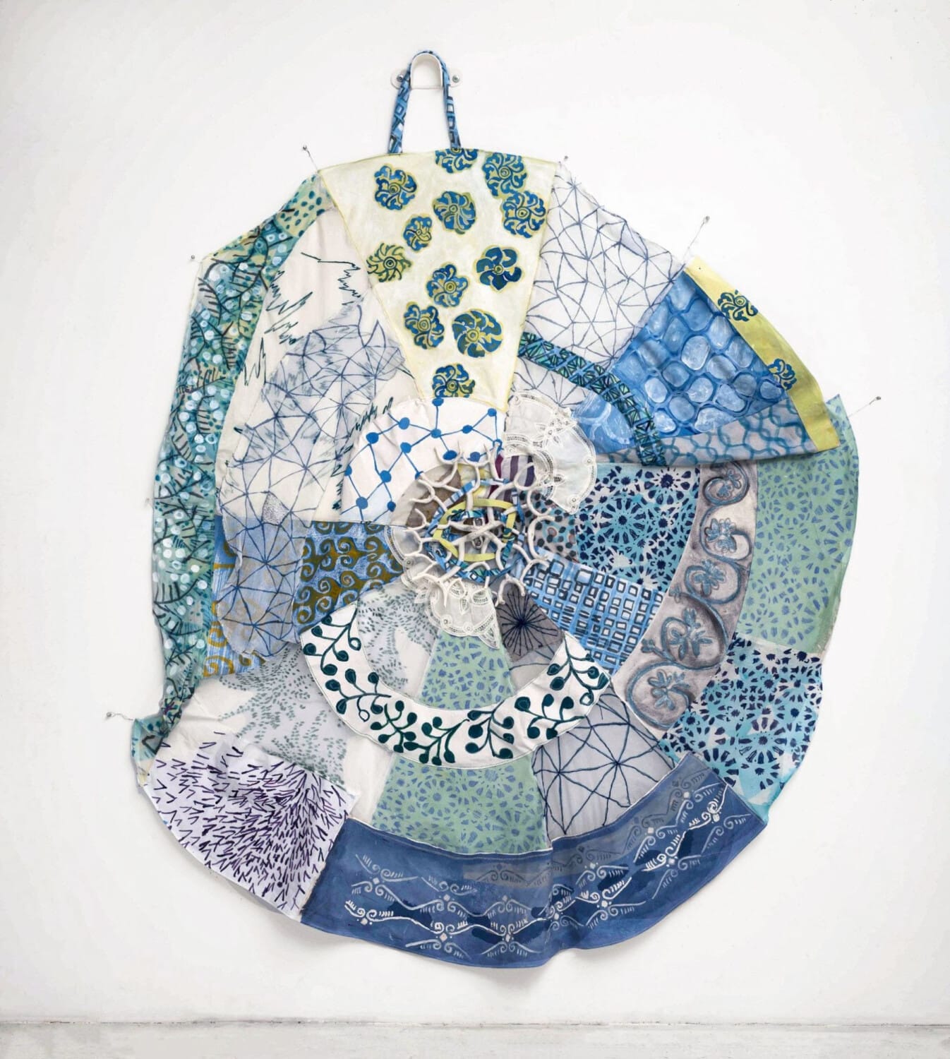 Fran Siegel, 2022, Porcelain mounts (top and center) painted and sewn fabric, scrim, 80 x 66 x 12 in., 203.20 x 167.64 x 30.48 cm.