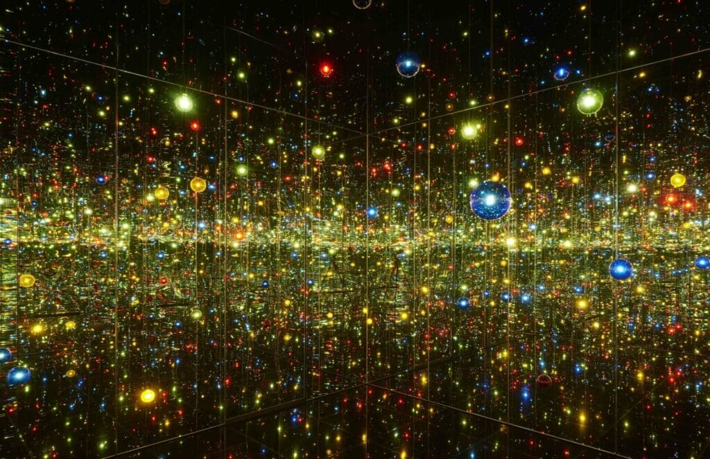 Yayoi Kusama / Infinity Mirrored Room - A Wish for Human Happiness Calling from Beyond the Universe, 2020
Mirrors, wood, LED lighting system, metal and acrylic panel / 293.7 × 417 × 417 cm / ©YAYOI KUSAMA / Courtesy of Ota Fine Arts