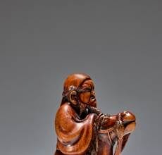 A wood Netsuke of a mounted Chinese horseman by Hoshin, Kyoto, late 18th century sold for €127,400