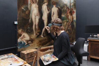 Conservator Britta New retouching The Judgement of Paris during the conservation treatment © The National Gallery, London