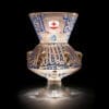 A Mamluk enamelled glass mosque lamp made for Chief of Corps Saif ad-din Sarghitmish (d.1358) Egypt or Syria, 1351-1358 AD. Sold for £5,130,400 (estimate: £600,000-1,000,000)